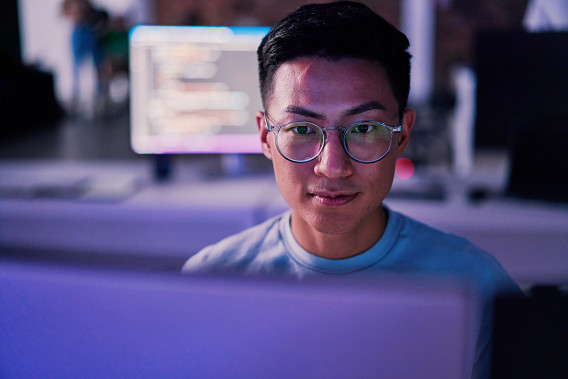 Man concentrating in front of computer