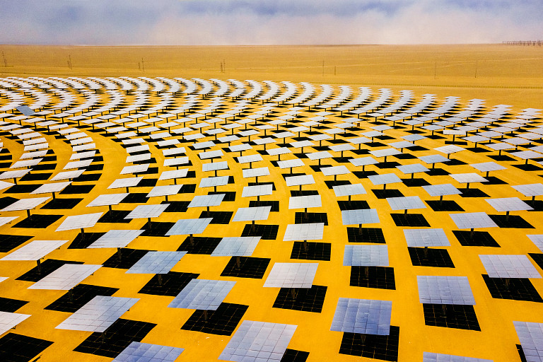 Circular solar panel installation in desert landscape